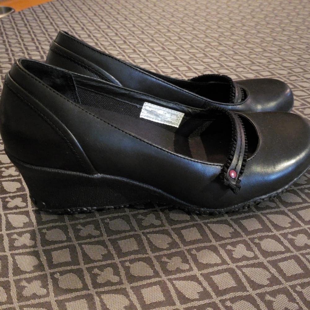Merrell Petunia Wedge. Worn once; too small.
